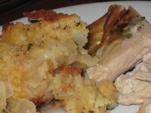 cornbread stuffing with bacon and caramelized onions, served w/ herb-rosted turkey breast